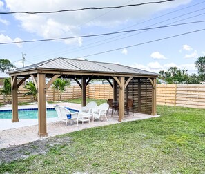 Extra large pergola with BBQ, lounge, dining and fan 