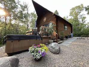 Beautiful private log cabin in trees at Sand Lake. 