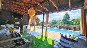 The cabana is the perfect place to relax by the pool or watch tv!