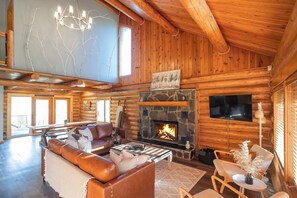 Great room with wood burning fireplace.  So cozy!