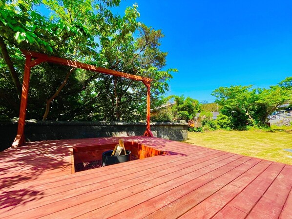 Dedicated wooden deck for barbecue and bonfire