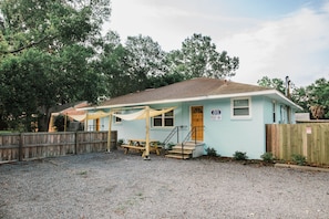 A convenient parking area with a covered picnic area, providing a shaded and comfortable space for outdoor gatherings and enjoyable picnics, rain or shine.