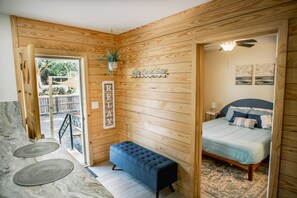 A cozy and comfortable one-bedroom space featuring a queen-sized bed, ensuring a restful and luxurious retreat for a peaceful night's sleep.