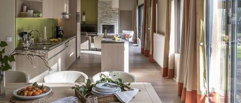 Table, Couch, Wood, Countertop, Interior Design, Floor, Cabinetry, Flooring, Condominium, Houseplant