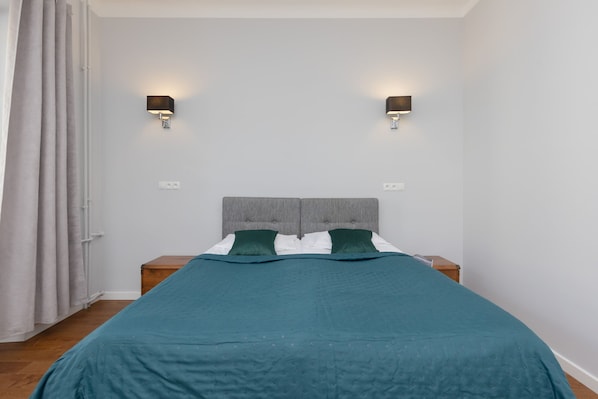 Comfortable double bed in the living room.