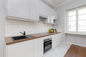Modern, fully equipped kitchenette.