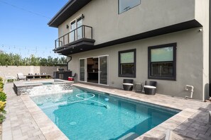 Pool and hottub are available to be heated upon payment and request. Master bedroom balcony.