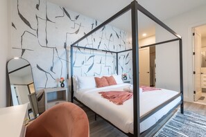 Cozy space with a soft bed,warm lighting, and peaceful vibes.