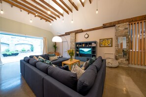 Living area with bifold door 