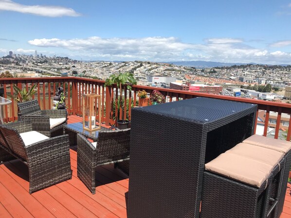 Birds-eye view of Salesforce Tower, Bay Bridge, and the city right on our deck.