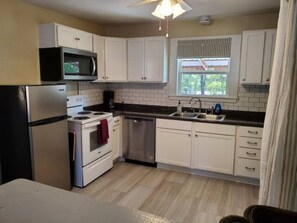 A fully stocked kitchen with many amenities for longer stays. 