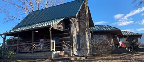 View of log cabin in winter