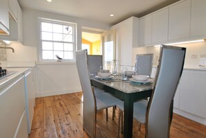 The dining kitchen is modern and well-equipped