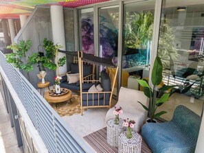 How fantastic is our balcony? Come out to enjoy a refreshing drink, catch a breath of fresh air, and feel the neighborhood's pulse.