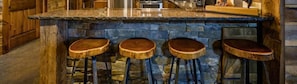 Prepare delicious meals in a kitchen that blends rustic charm with modern functionality.