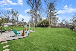 Enjoy a huge fenced in yard with a nice back patio