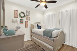 Second Bedroom: Has a twin bed with a twin pull out trundle underneath.