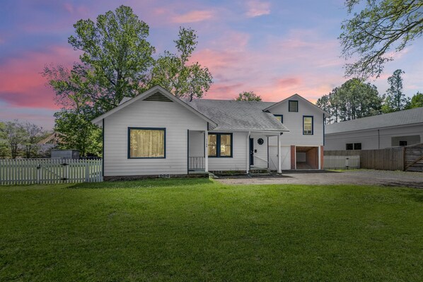 Welcome to the sprawling Bamboo Estate, a gated 1 acre mid century modern themed property in the center of town.