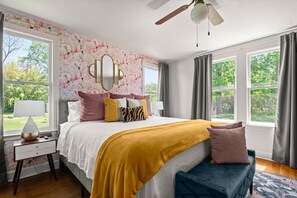 Soak in the picturesque view from outside the bedroom, where nature's beauty unfolds before your eyes, inviting you to embrace serenity and tranquility.