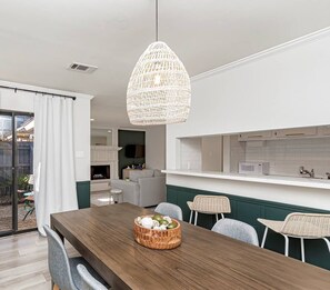 Dining/bar area leading out to your private front porch, living area and kitchen