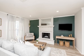 The cozy living area is perfect after a hard day's travel or visiting with friends and fammily.