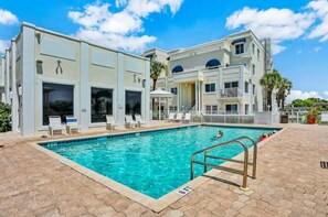 Refreshing swimming pool oasis, perfect for relaxation and fun.