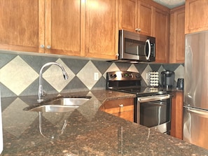 Kitchen (coffee maker/coffee,pots,pans,dishes,glasses, BBQ utensils and more.