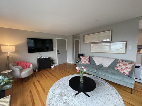 Living room with lots of light and views of Halifax Harbor. 