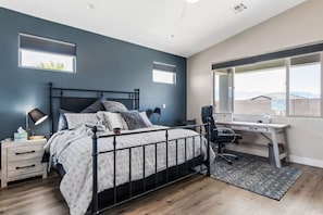Large primary bedroom #1 with work space and attached bath.