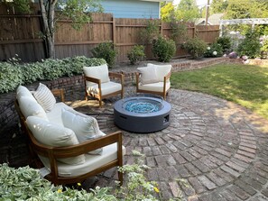 Outdoor gas fire pit. Please note this is not outside during winter rainy season