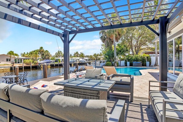 Enjoy the comfort of shaded outdoor seating for a relaxing experience