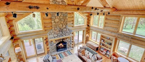 Picturesque living room with wood fireplace.