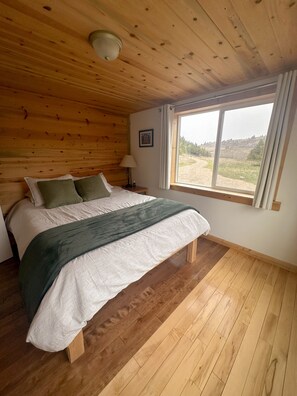 Main (queen) bedroom with beautiful view of the mountains. 