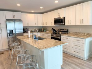 Kitchen island with four barstools