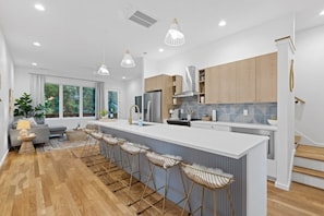 Walk into a light filled open space with the kitchen and living connected.