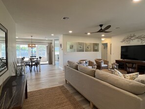 Open floor plan; View from the entry of the living room and dining area