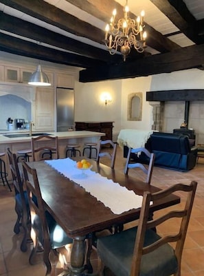 Kitchen with all modern appliances and dining table for 8-9 guests. 