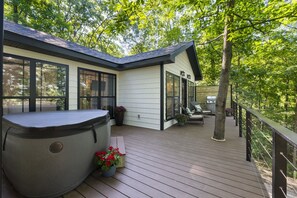 Your private deck with 2-person hot tub & comfy Adirondack chairs.