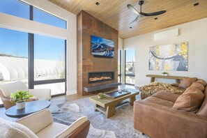 Relax in the oversized living room with valley views