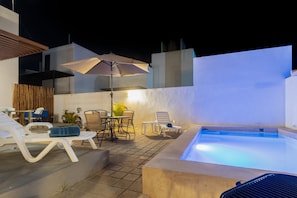 Dive into luxury with a refreshing swim in your private pool, then unwind in the comfortable outdoor sitting area