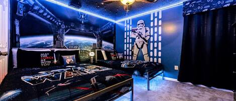 Upstairs bedroom with a cool Star Wars theme, perfect for young enthusiasts