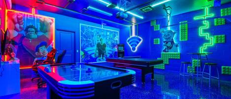 The game room is stylishly furnished with Wreck-It Ralph theme with stylish lights (Arcade machine free to play)