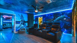 Avatar-themed theater room, immersed in water-inspired ambiance