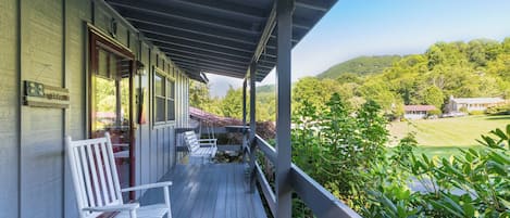 Two Rockers and a Swing on the front porch. Mountain Views