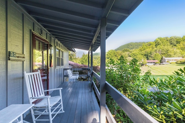 Two Rockers and a Swing on the front porch. Mountain Views