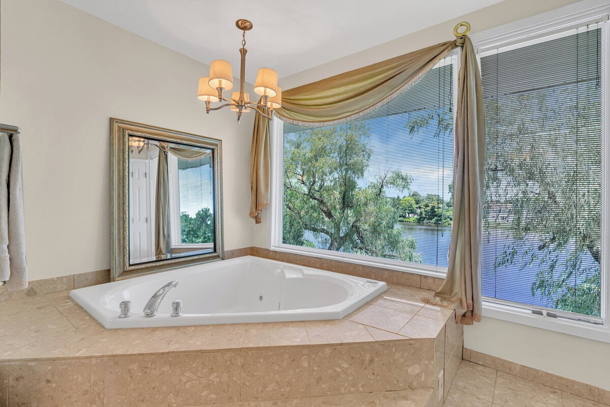 5 bedroom 3 bath lake front Home with water views from every room in the house.