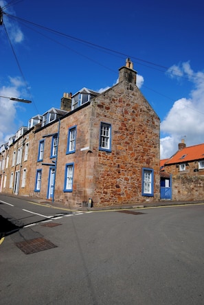 Auld Fisher’s Hoist forms the upper two levels of a traditional home