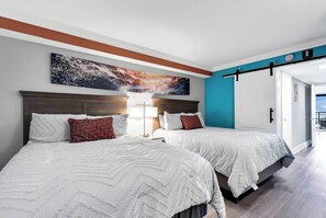2 Queen Beds to relax in after enjoying the beach!