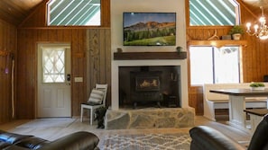 Smart TV and wood fire stove take center stage