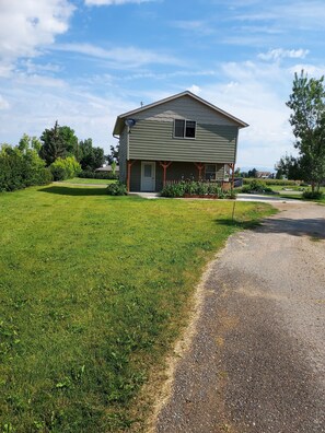 Large drive way large grass area